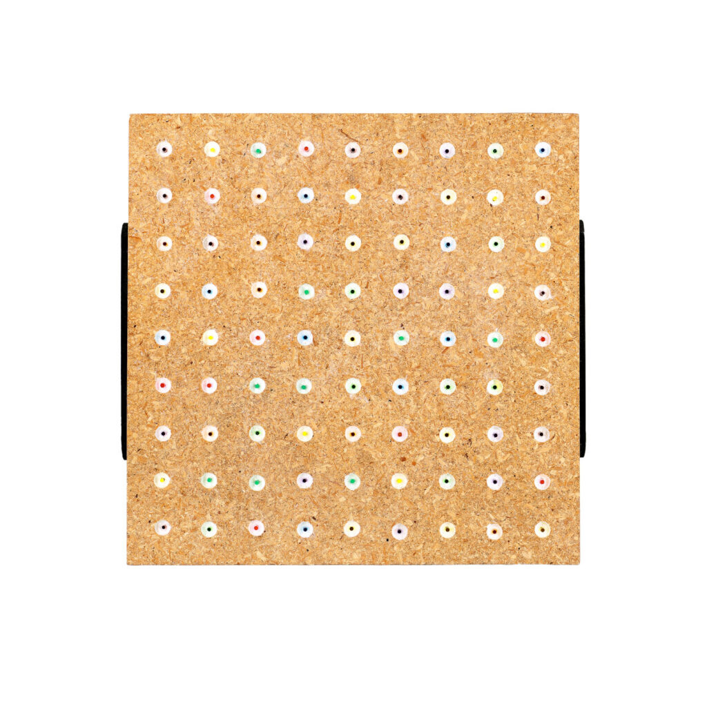 Wall sculpture titled 'S-028' made of chipboard with acrylic paint and rod, featuring a square panel with a grid of colorful pegs arranged in rows on a cork-like surface.