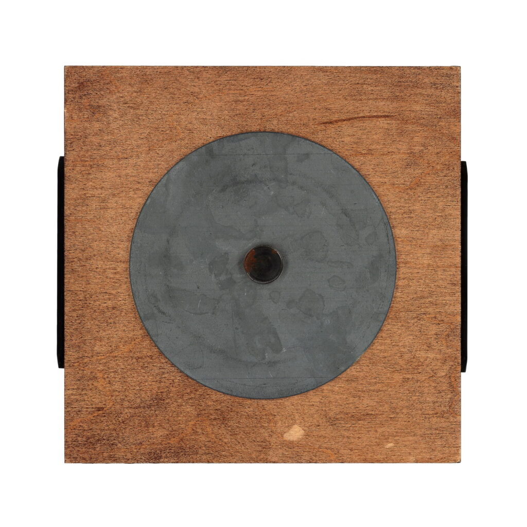 Wall sculpture S-006 made of birch plywood with a centered steel disc, square shape with a natural wood finish