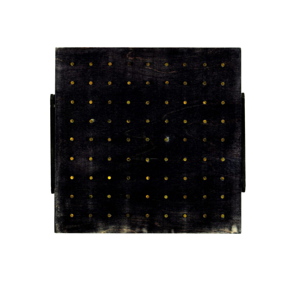 Wall sculpture titled S-026, a 7.5 x 7.75 x 0.875 inch piece made of birch plywood with woodstain and brass rods, shown as a dark square panel with a grid of evenly spaced small brass dots